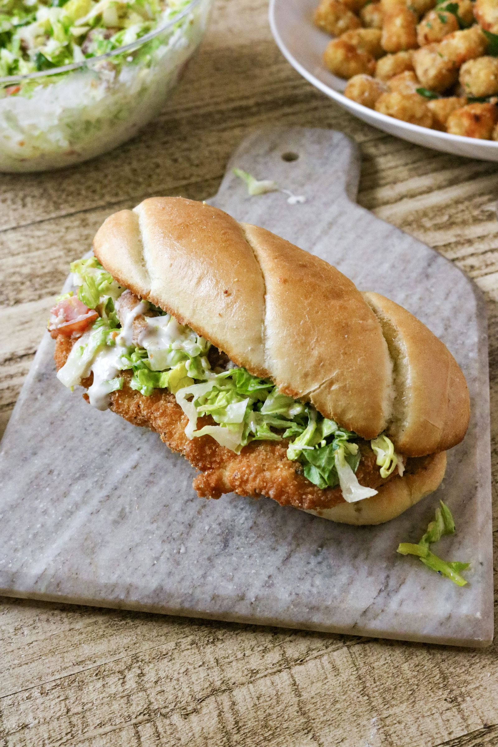 Chicken Caesar Sandwich with Truffle Tots
